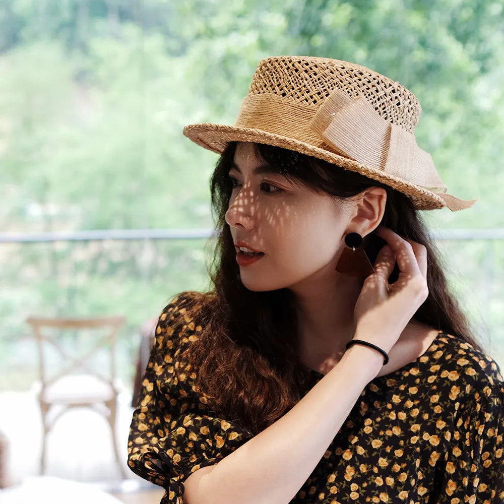 Handwoven Raffia Straw Boater Hat with Hollow Out Twist Knit and Jute Bow Trim for Women - Verdant Bind