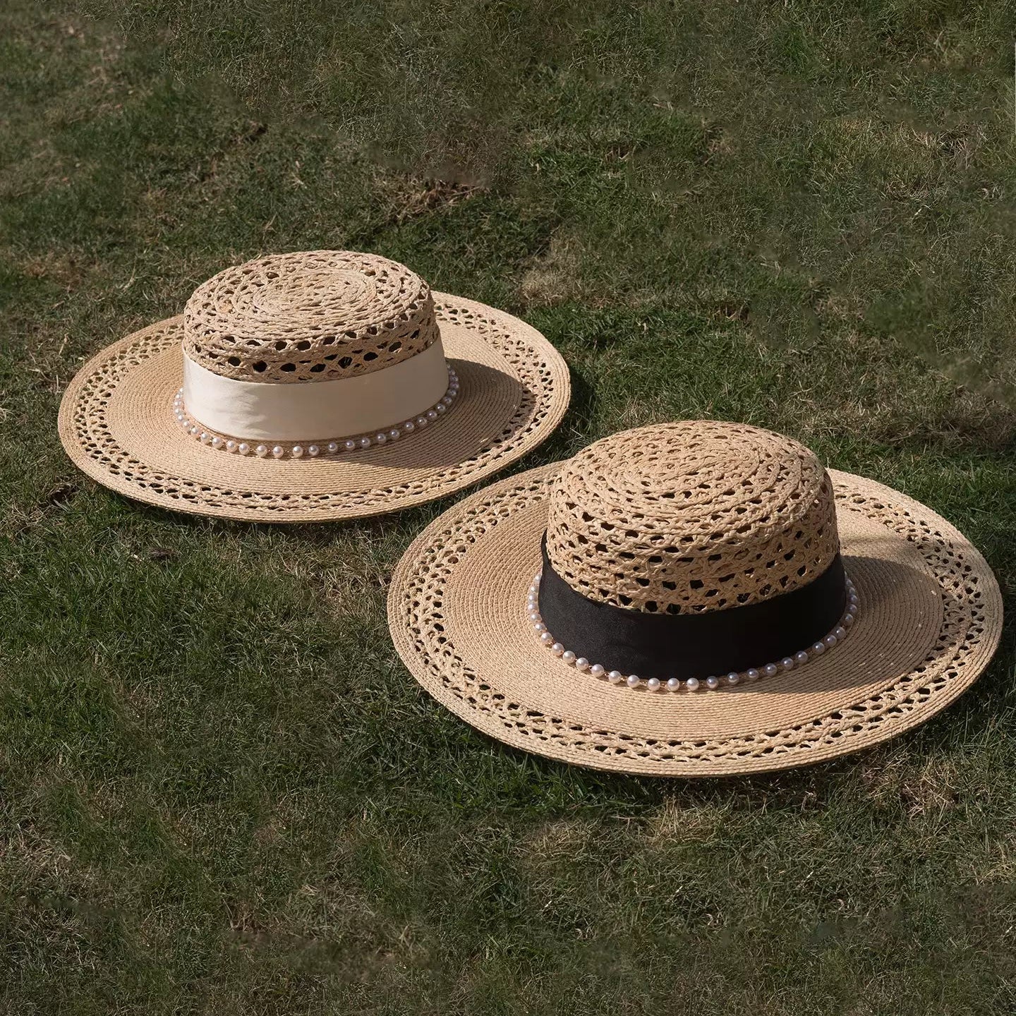 Two straw hats on a grassy background with 'Madhatter Alice' branding.